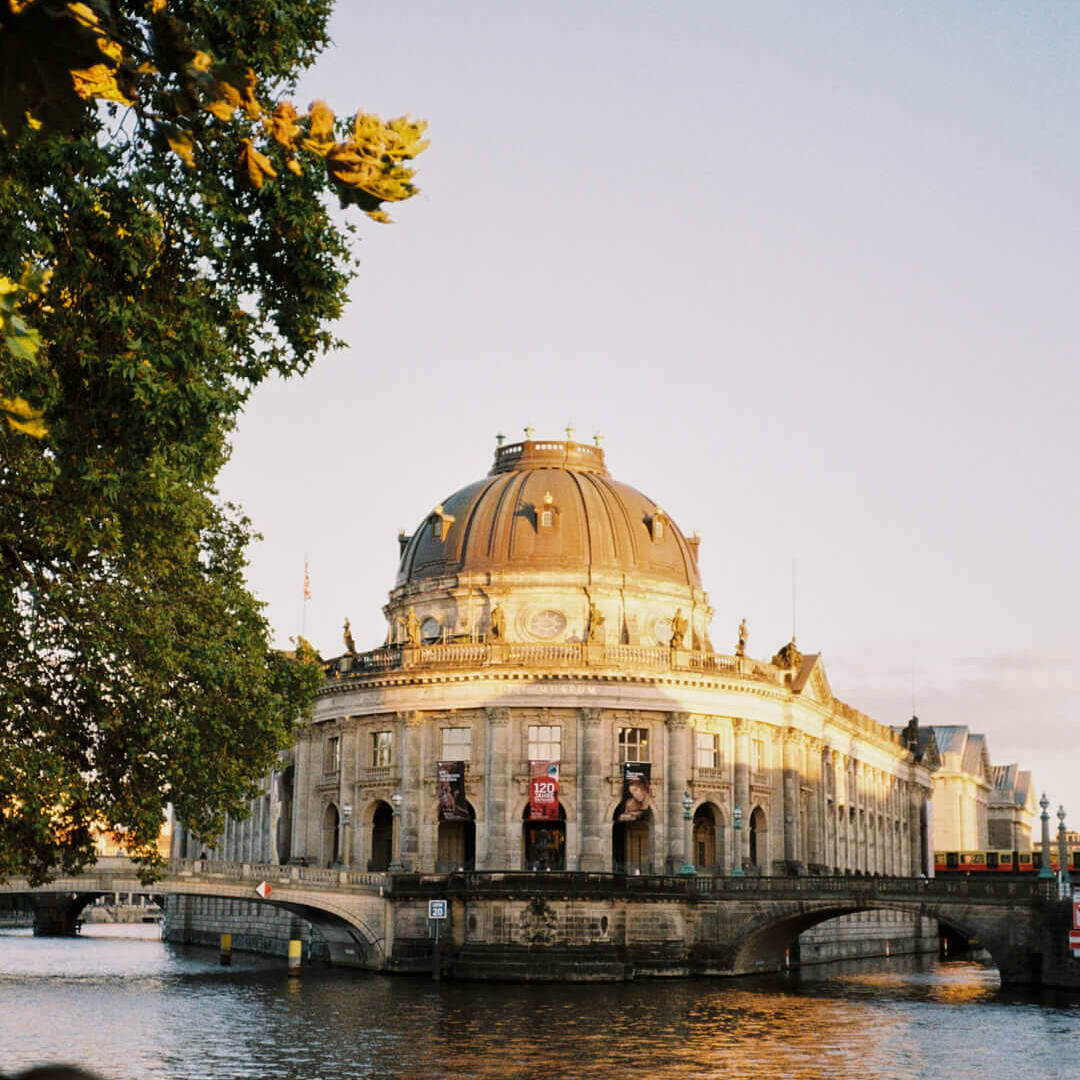 The majestic Bode Museum on Museum Island in Berlin is beautifully reflected in the Spree River at sunset. This shot captures the elegance of Berlin’s architecture and the cultural richness of its museums.